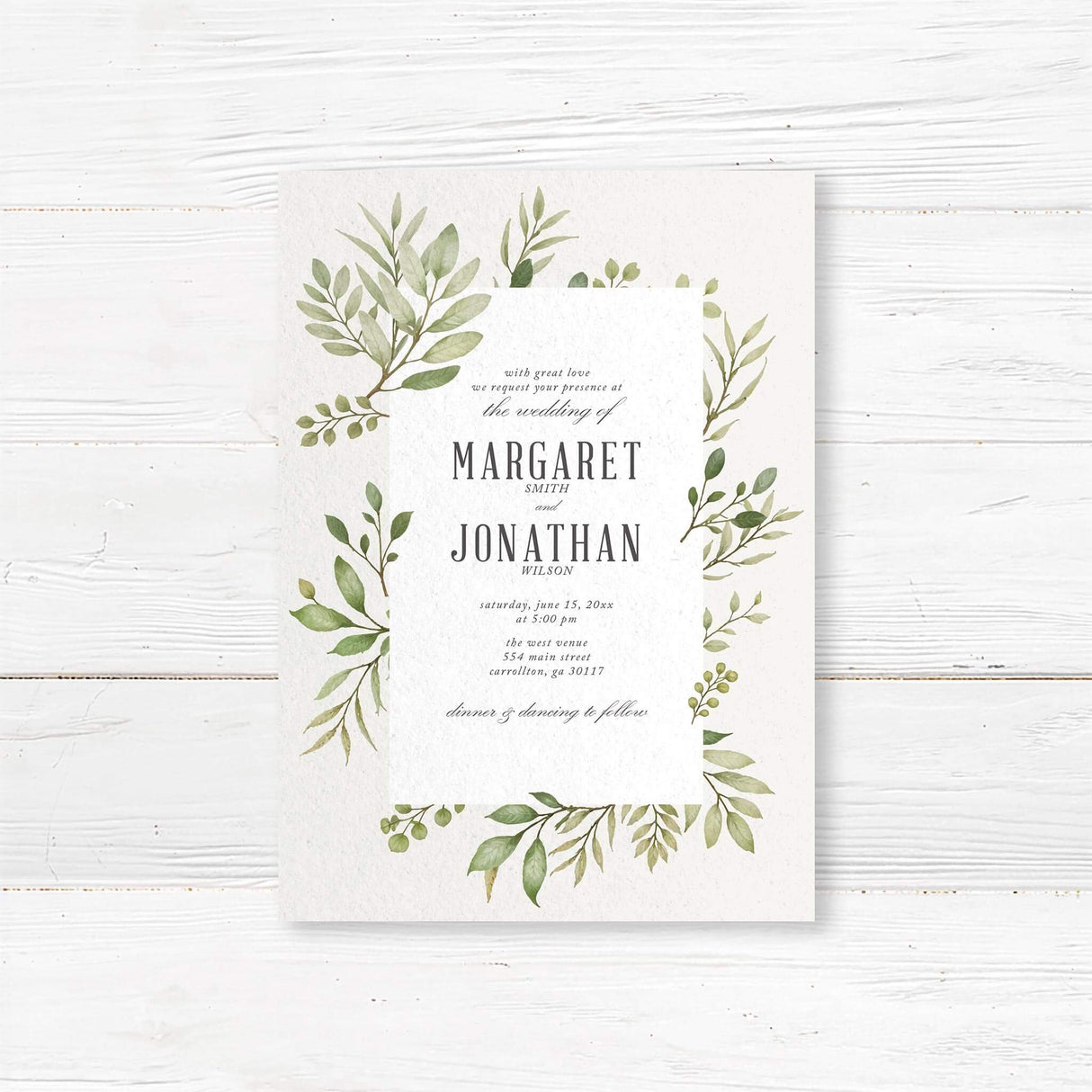 Elegant greenery wedding invitation with watercolor foliage on textured ivory cardstock. Customizable with names, wedding date, and venue details. Ideal for rustic outdoor weddings, minimalist botanical themes, and modern garden ceremonies. Printed on high-quality cardstock with matching envelopes for a timeless wedding stationery suite.