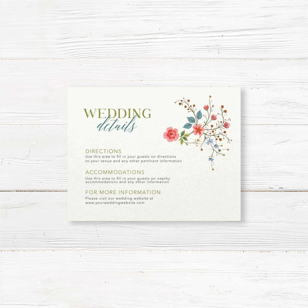 A details card with a background that features an elegant floral design with pink, blue, and yellow flowers, green leaves, and delicate branches adorning the top and bottom. The text is styled in a mix of serif and script fonts, creating a romantic and timeless feel. Event details, including the date, time, and venue, are clearly displayed in a well-balanced layout. This design exudes classic elegance, perfect for a garden, vintage, or floral-themed wedding celebration.