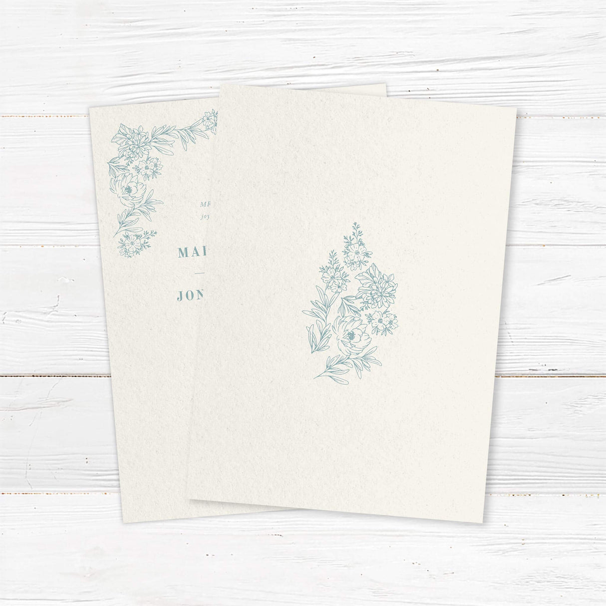 Elegant wedding invitation featuring delicate floral line art in soft muted tones. A minimalist and sophisticated design with elegant typography, perfect for classic, modern, and garden weddings. Back.