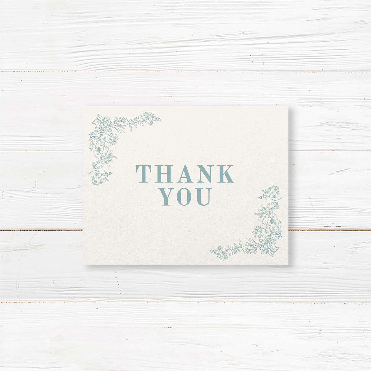 Charming thank you card with a delicate floral line art design, perfect for expressing gratitude with sophistication and elegance. A timeless keepsake for wedding guests and loved ones.