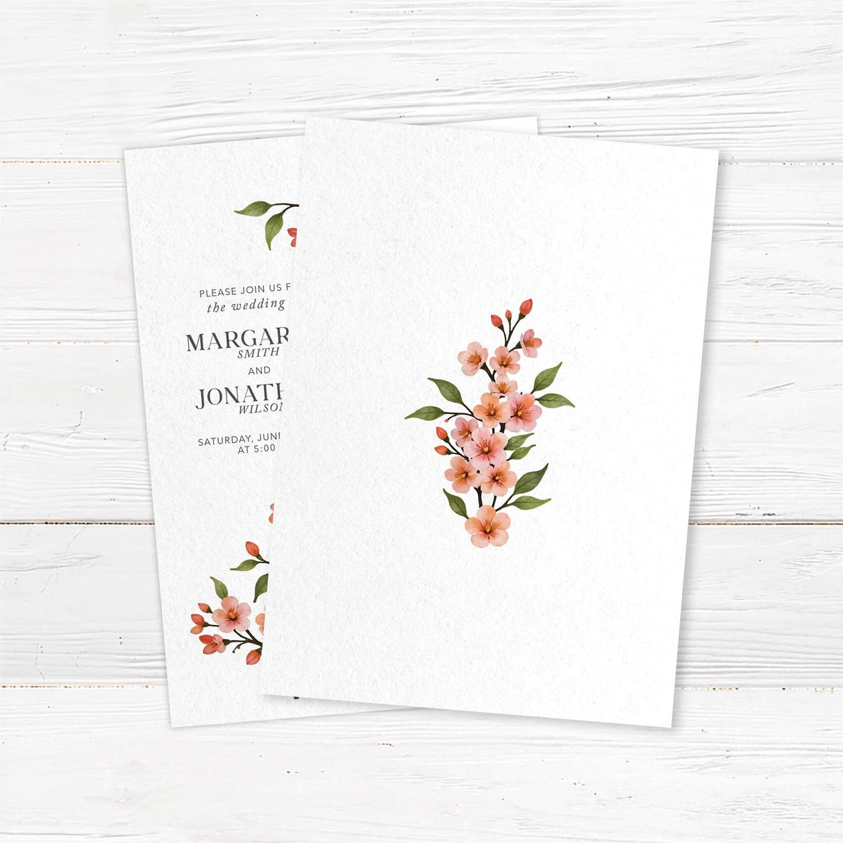 Romantic cherry blossom wedding invitation with delicate watercolor floral vines on textured white cardstock. Customizable with names, wedding date, and venue details. Perfect for garden weddings, rustic outdoor ceremonies, and elegant spring weddings. Printed on premium cardstock with matching envelopes for a timeless and sophisticated touch. back