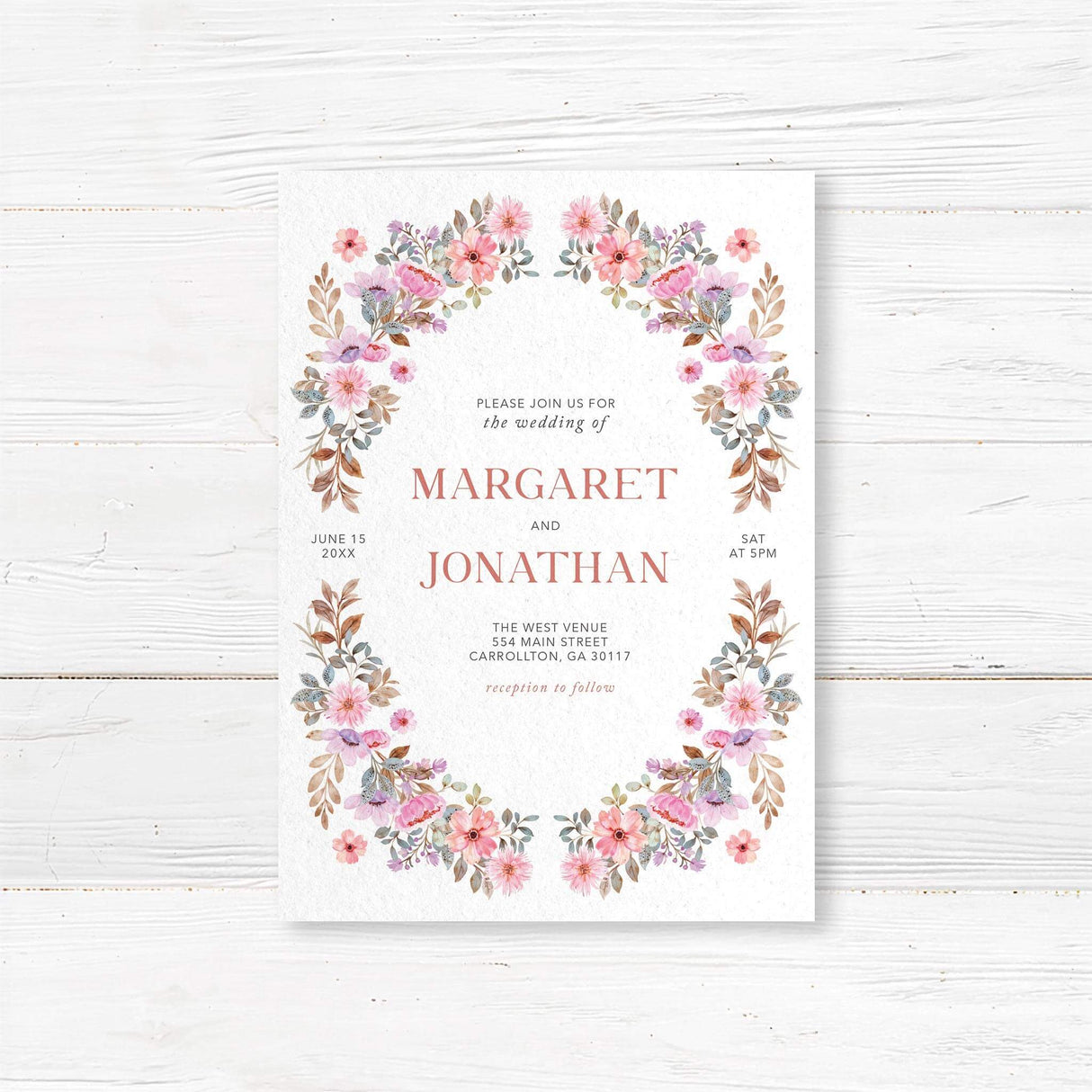Elegant floral wedding invitation featuring hand-painted watercolor wildflowers in a romantic garland wreath design. Printed on luxury textured cardstock, this boho botanical invitation is perfect for rustic, vintage, country, and garden weddings. Fully customizable with names, wedding date, and venue details to match your wedding theme.