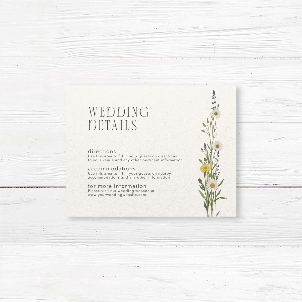 Wedding details card featuring a soft watercolor wildflower bouquet with daisies, lavender, and greenery. Designed to provide guests with essential venue, accommodation, and event information in a sophisticated and stylish way.