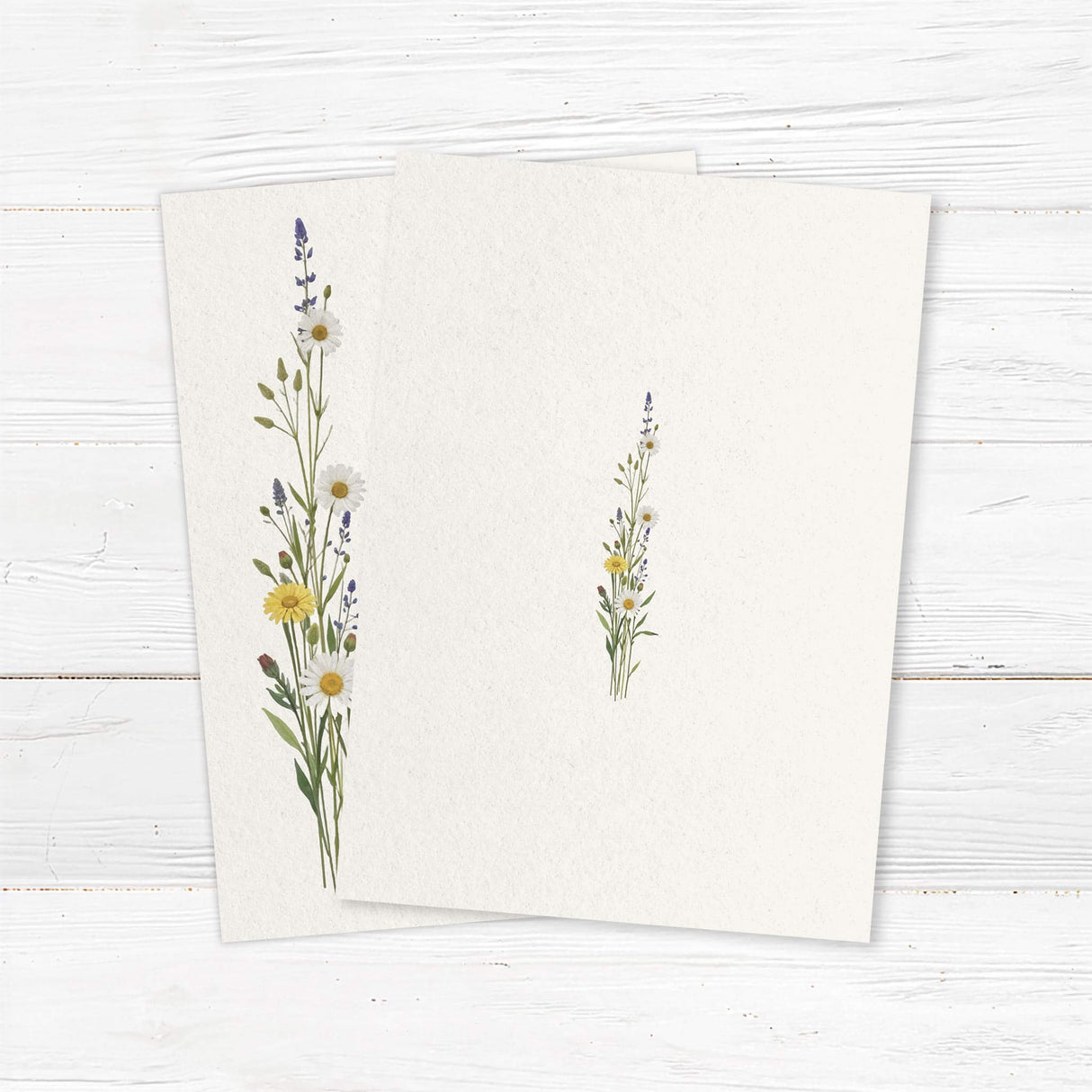 Elegant wedding invitation featuring a delicate watercolor wildflower bouquet with daisies, lavender, and greenery. A minimalist layout with soft floral accents creates a romantic and timeless design, perfect for rustic, garden, and nature-inspired weddings. Back.