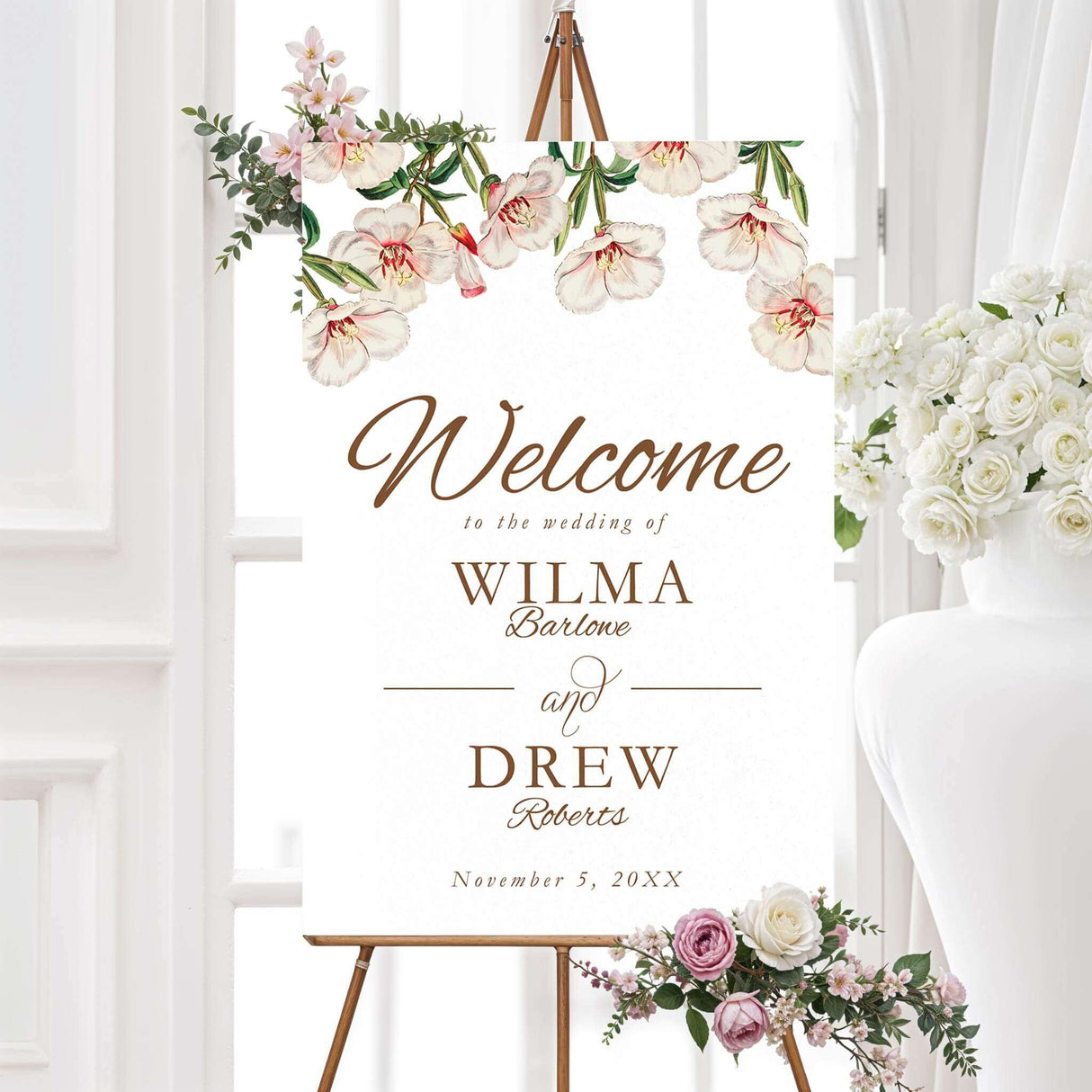Wedding welcome sign with delicate watercolor florals and customizable serif text. Printed for Spring in Bloom suite. Ideal for spring or garden wedding entrances.