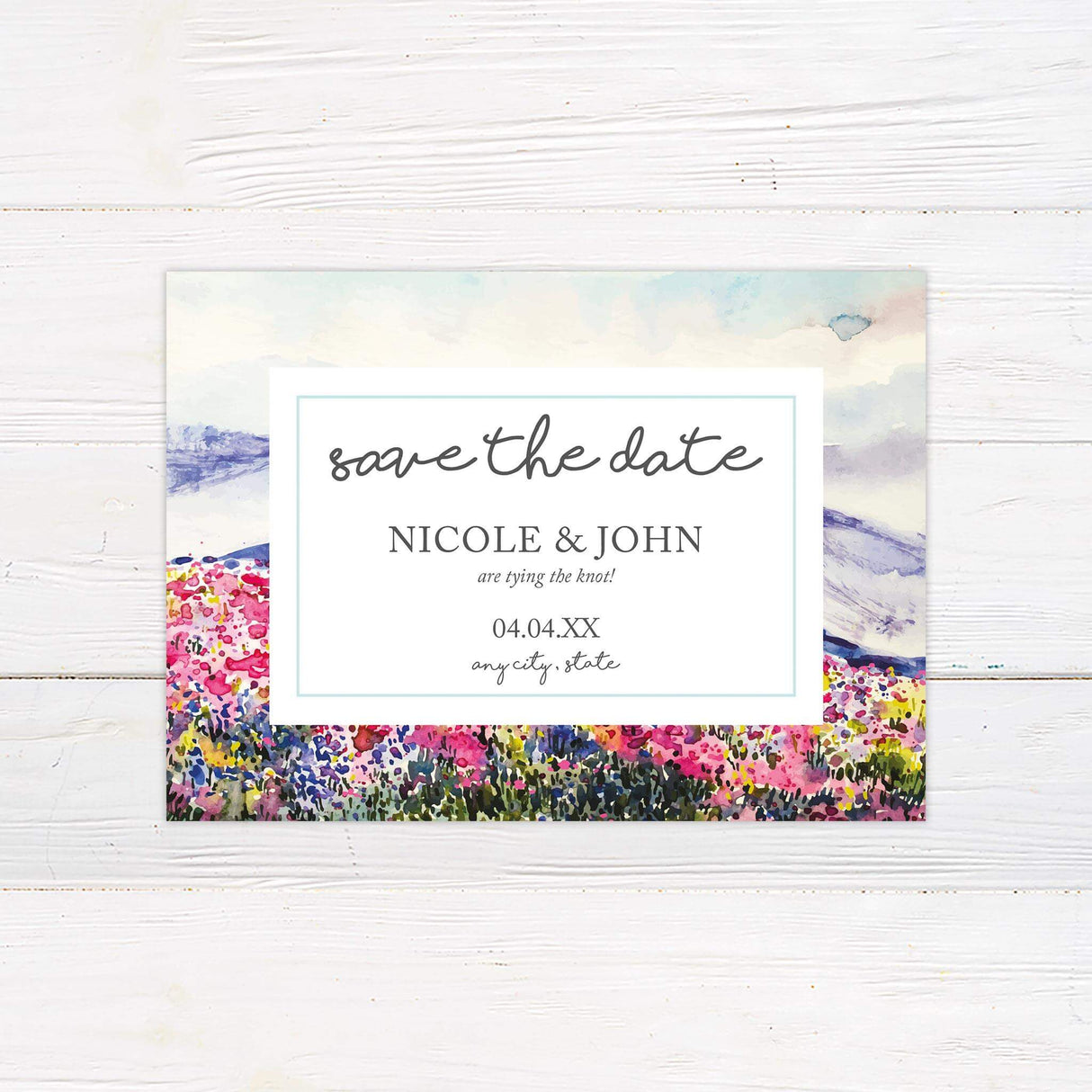 Save the Date card with watercolor scenery and coordinated fonts from the suite.
