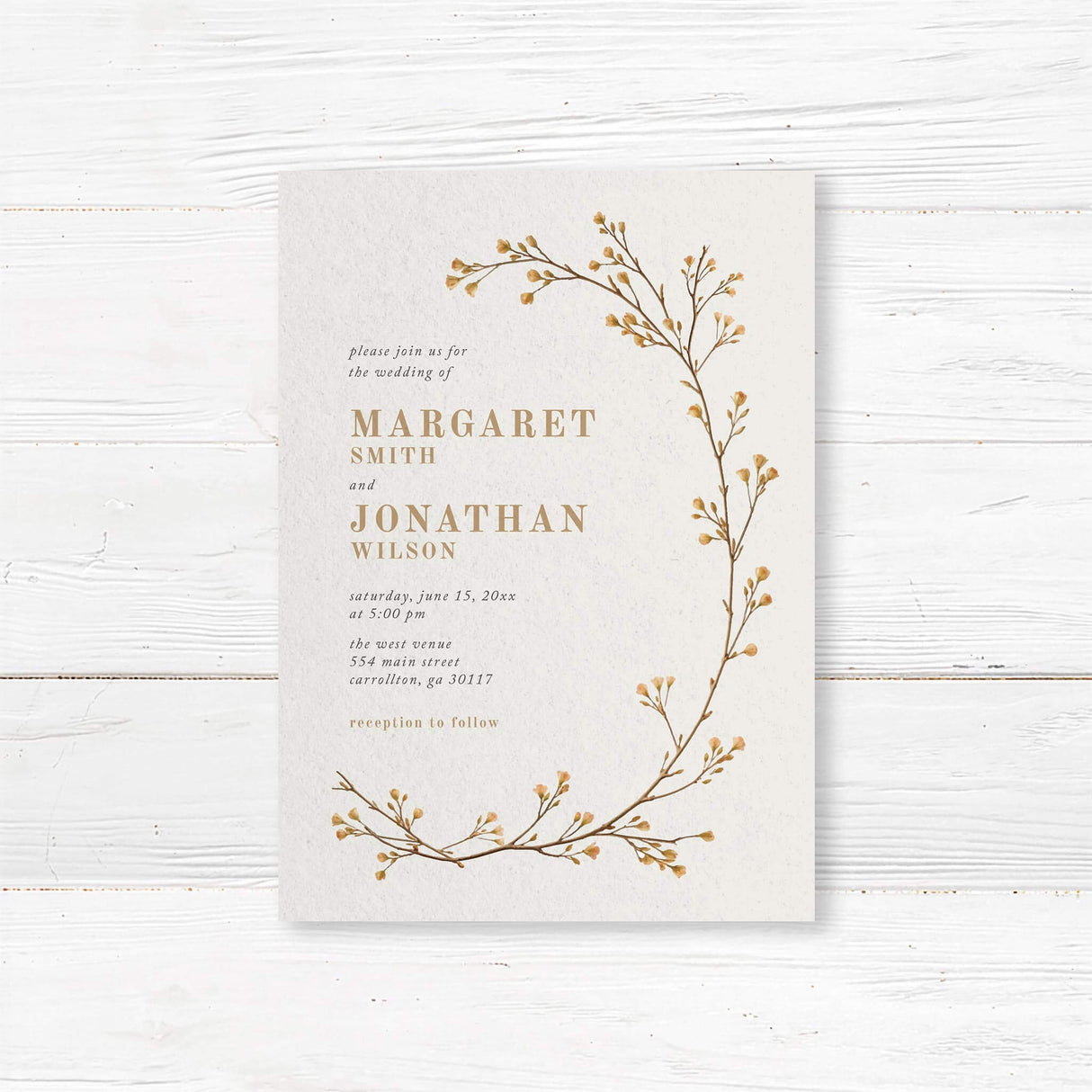 Minimalist botanical wedding invitation featuring delicate gold vine illustrations on textured ivory cardstock. Customizable with names, wedding date, and venue details. Perfect for rustic, boho, and nature-inspired weddings. Professionally printed on high-quality cardstock with matching envelopes included for a timeless wedding stationery suite.