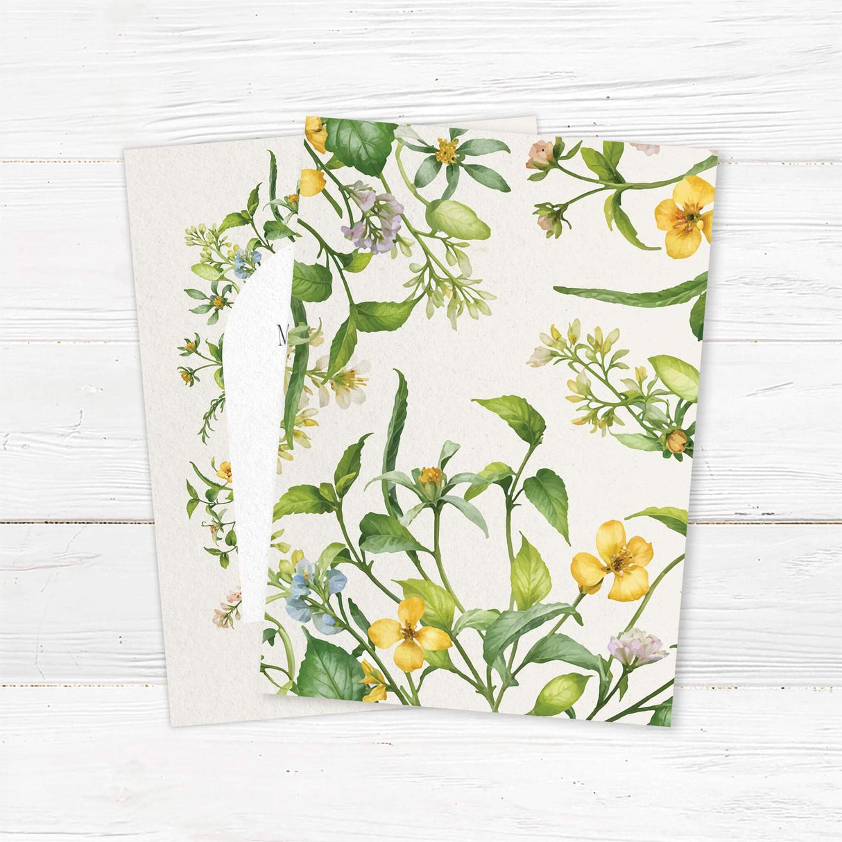 "Elegant wedding invitation featuring a delicate watercolor floral arch with soft yellow, green, and pastel blooms. The modern arched text area creates a timeless and romantic aesthetic, perfect for nature-inspired weddings." Back.