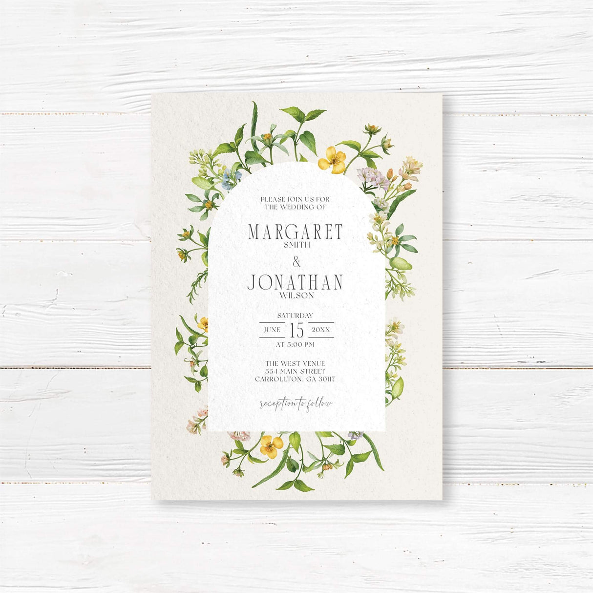 "Elegant wedding invitation featuring a delicate watercolor floral arch with soft yellow, green, and pastel blooms. The modern arched text area creates a timeless and romantic aesthetic, perfect for nature-inspired weddings."