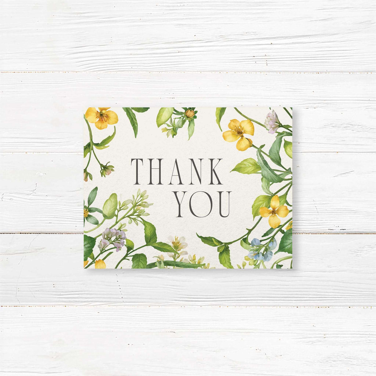 Beautiful thank you card with a soft watercolor floral arch design, perfect for expressing gratitude with elegance and charm. A timeless keepsake for wedding guests