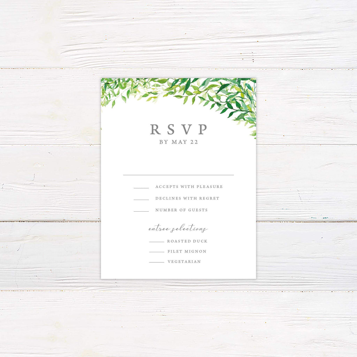 Matching RSVP card with watercolor greenery accents and simple response layout.