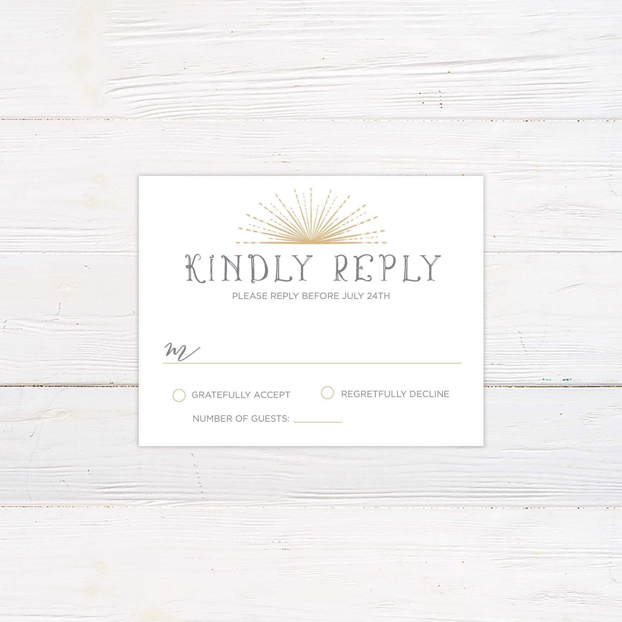 RSVP card featuring a coordinating gold starburst design with modern serif and script fonts, part of the Starburst wedding suite.