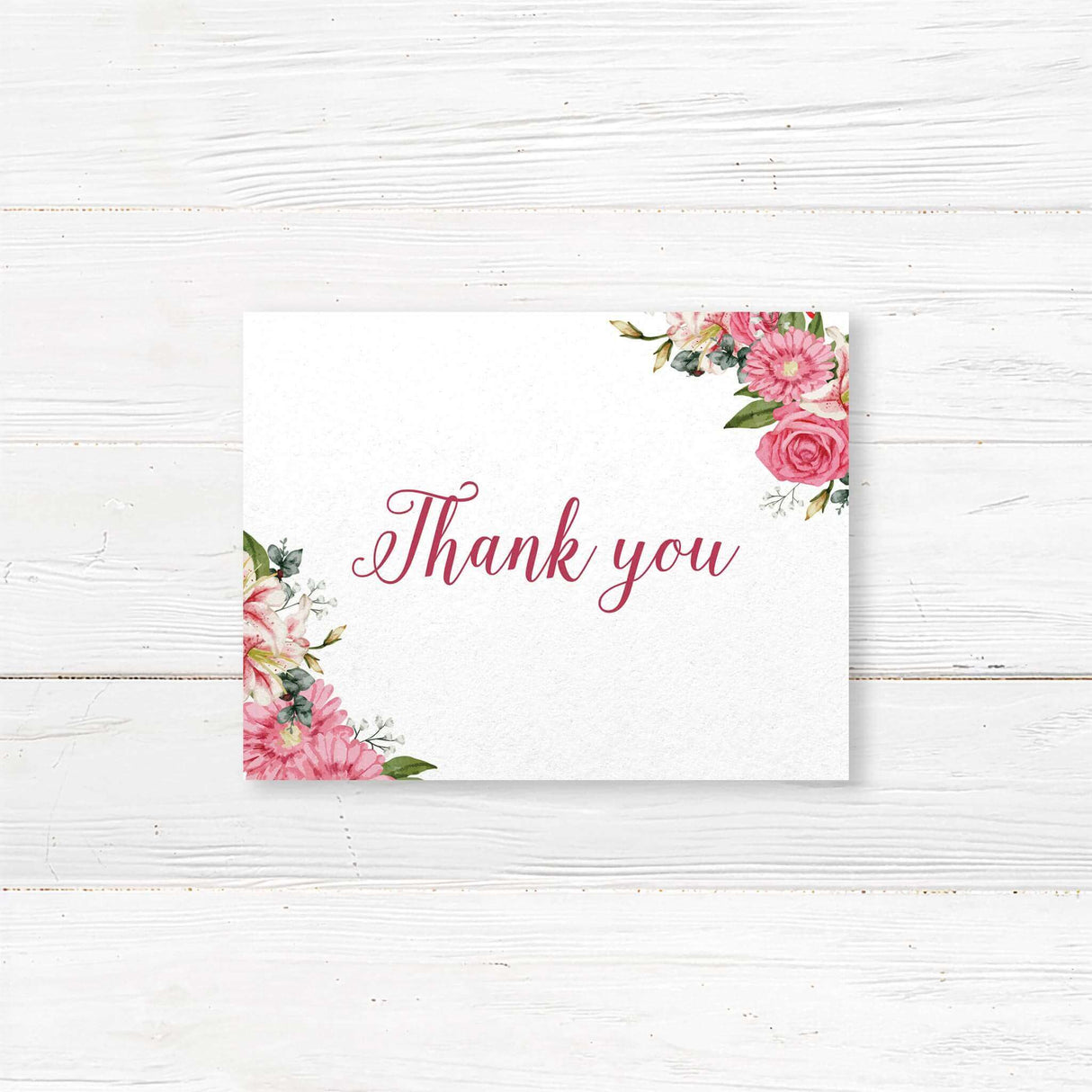 Thank you card with pink watercolor stargazer lilies and script fonts on white cardstock. Part of the romantic floral Stargazer Spring wedding suite.