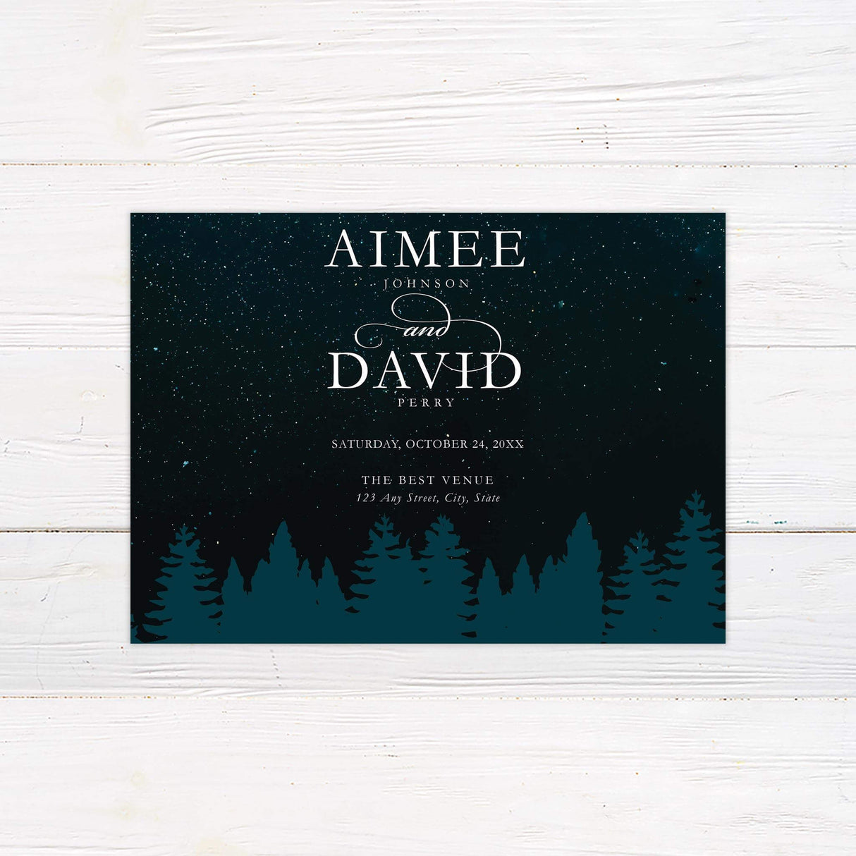 Save the Date card with night sky sparkle and pine treeline graphic, coordinating with the Starry Treeline invitation set.