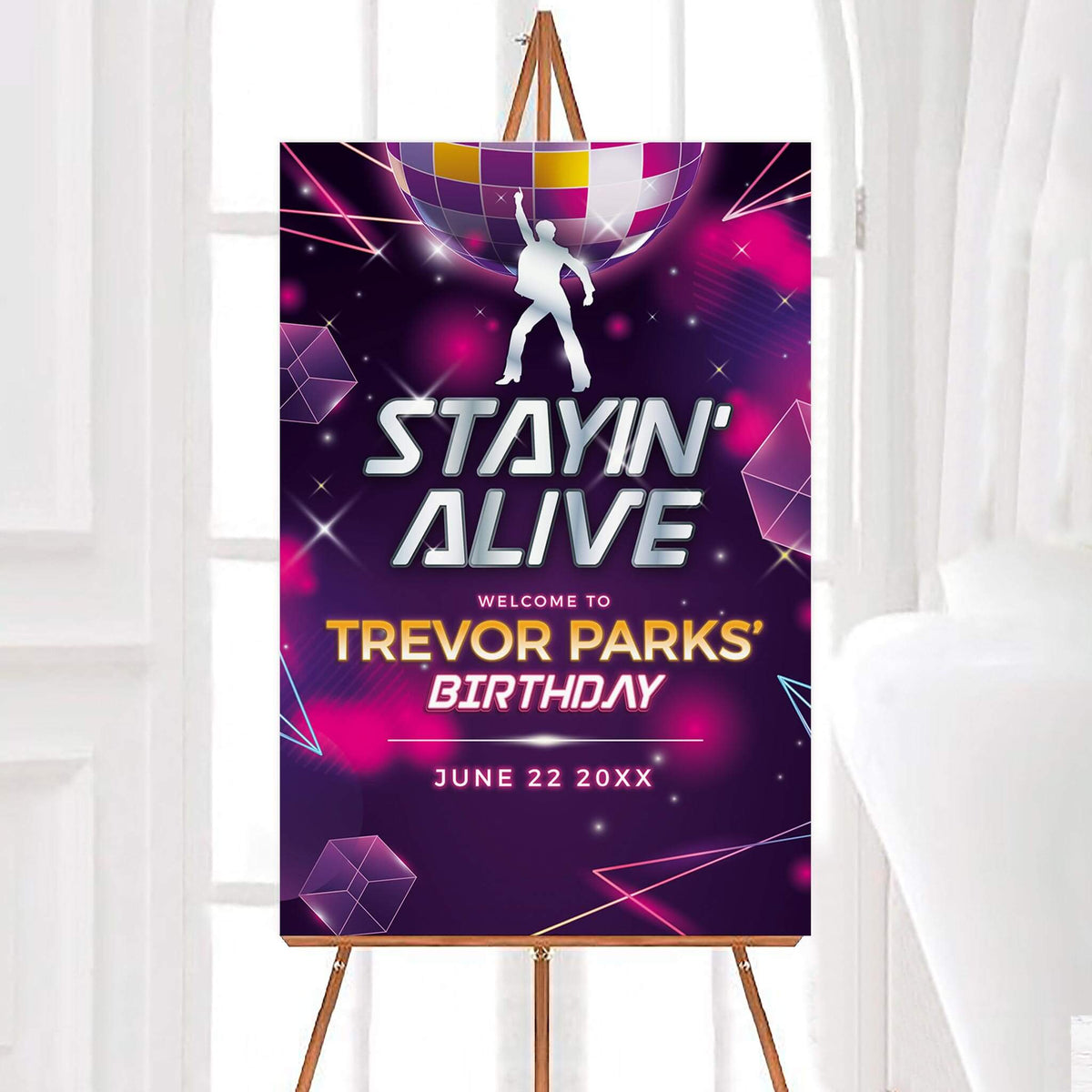 Personalized Stayin' Alive disco birthday welcome sign featuring a colorful disco ball, dancing silhouette, and neon pink and purple background. The retro birthday party sign includes sparkling accents, bold silver lettering, and customizable name and date.