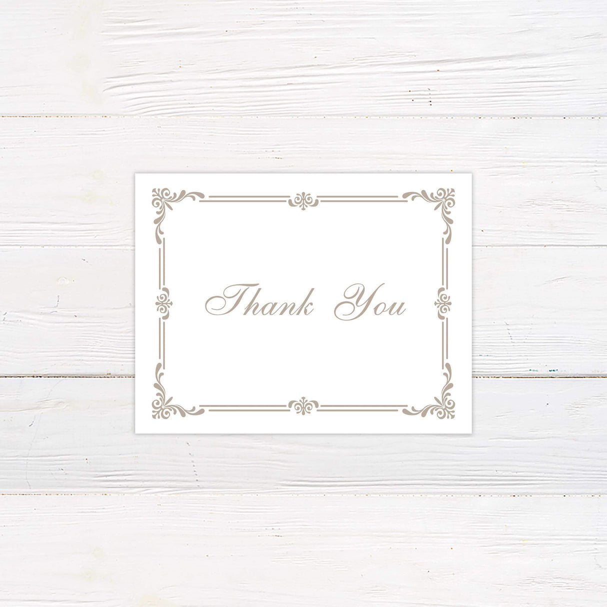 Printed thank you card with matching vintage scroll frame and classic fonts from the Storybook wedding invitation collection.