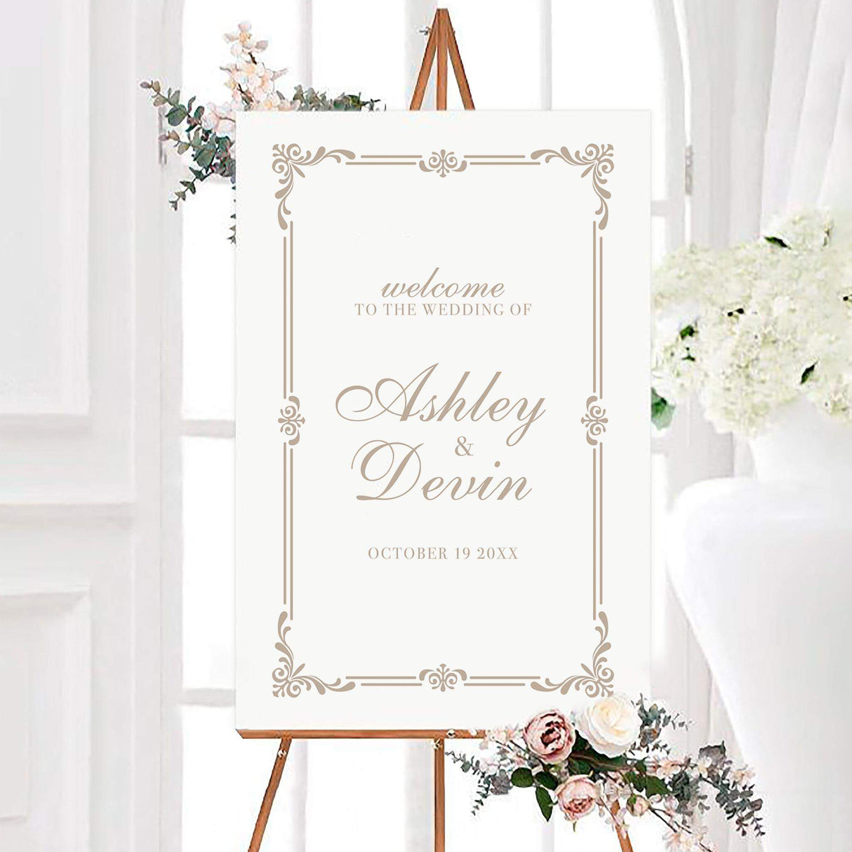 Elegant storybook wedding welcome sign with champagne beige calligraphy and an ornate vintage-style border on a white background. The personalized design features the couple’s names and wedding date in romantic typography.