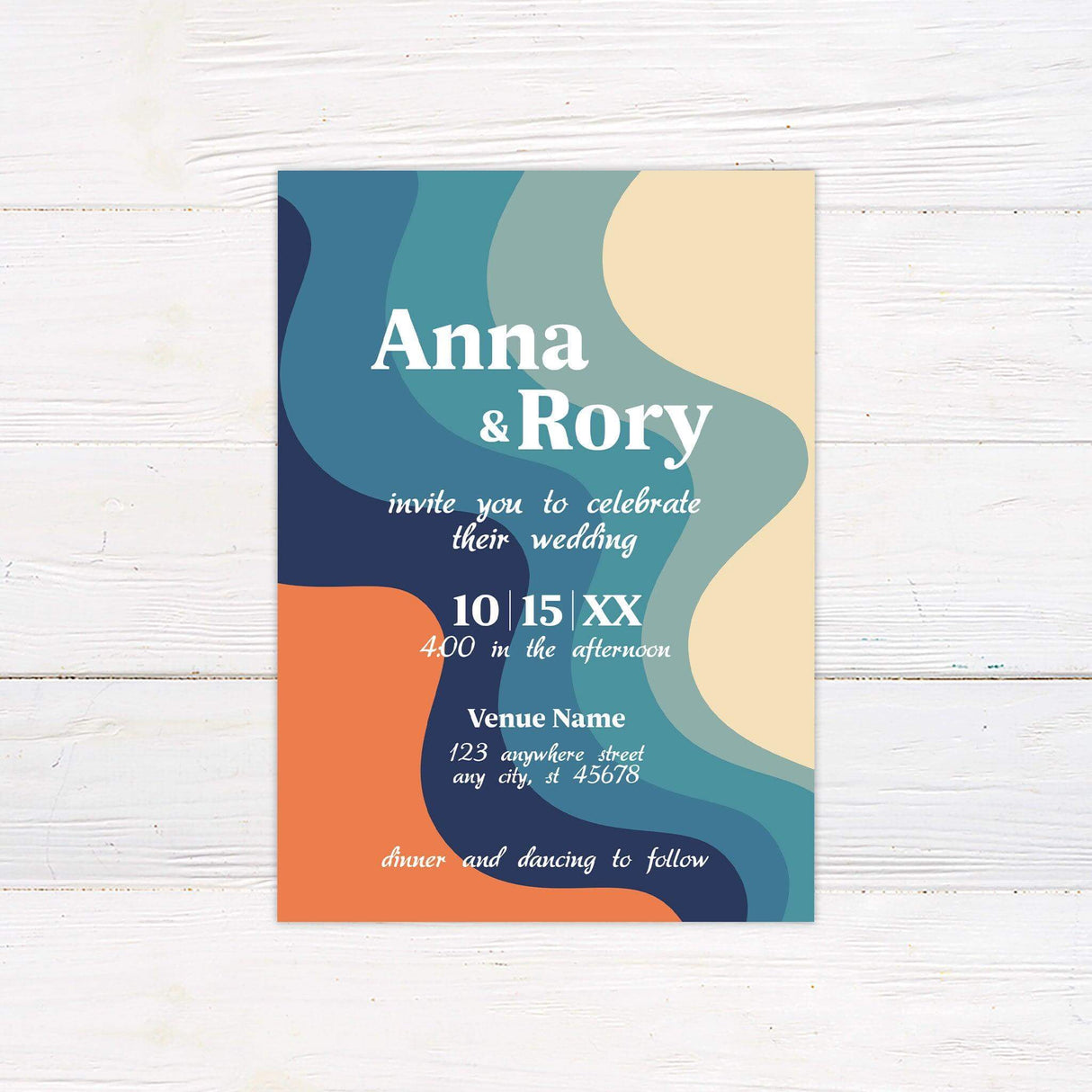 Colorful retro 70s wedding invitation with bold wavy stripes in orange, teal, and navy and groovy vintage fonts on cream background.
