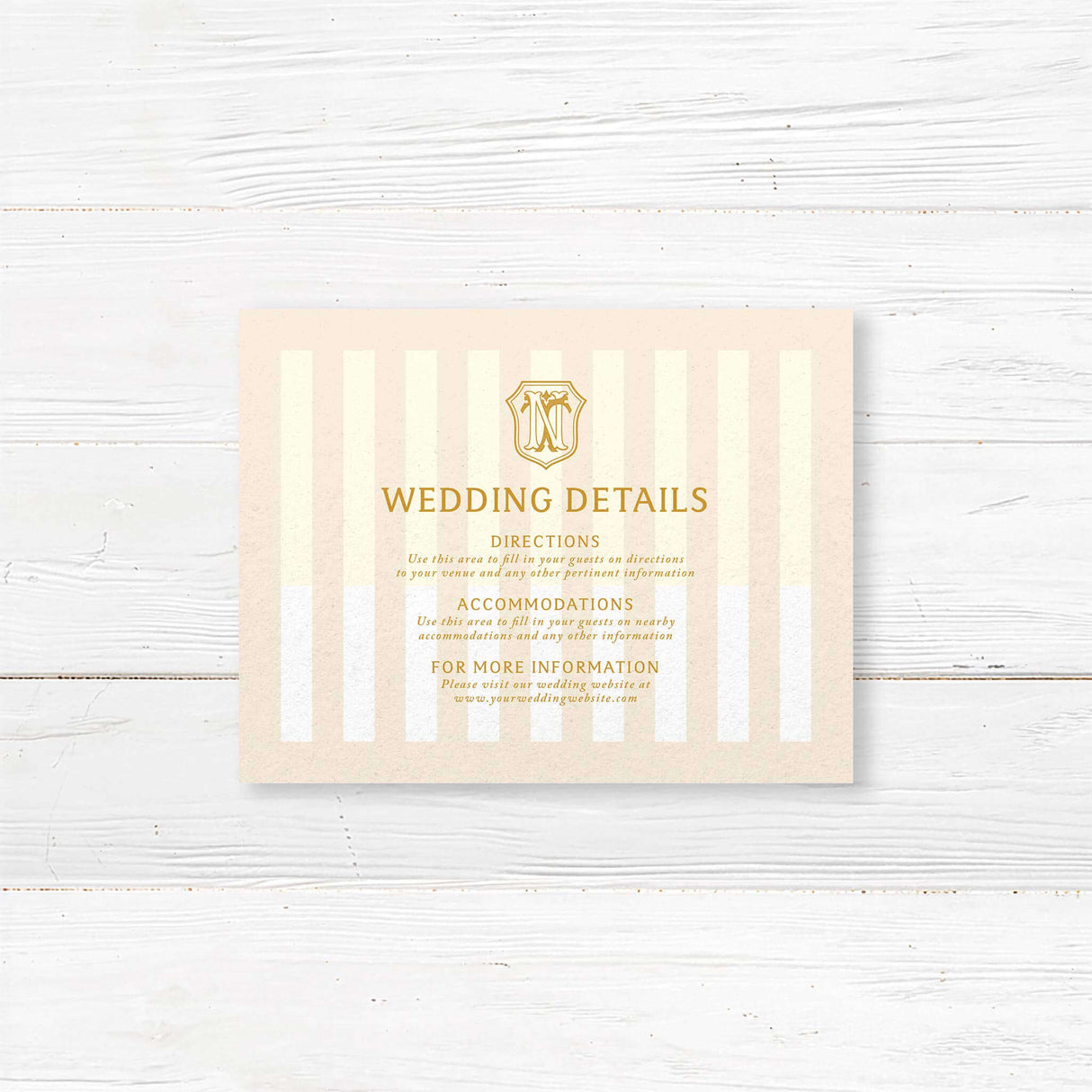 Cream and gold wedding detail card with vertical stripes and serif text