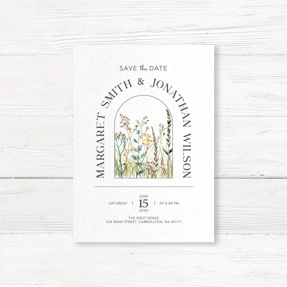 Nature-inspired save the date card with hand-painted wildflowers and a modern arch design. Customizable with names, wedding date, and location. Printed on premium cardstock with optional envelopes. Ideal for rustic, garden, and outdoor weddings, ensuring guests mark their calendars in style.
