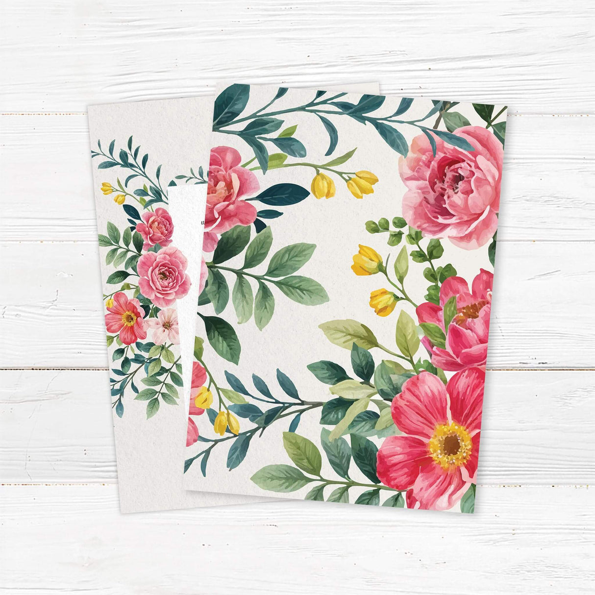 Elegant wedding invitation with a floral design featuring pink and red roses, green leaves, and delicate typography. The text is framed within a white rectangle, providing event details in a classic serif font. A romantic and timeless design perfect for wedding celebrations. Back.