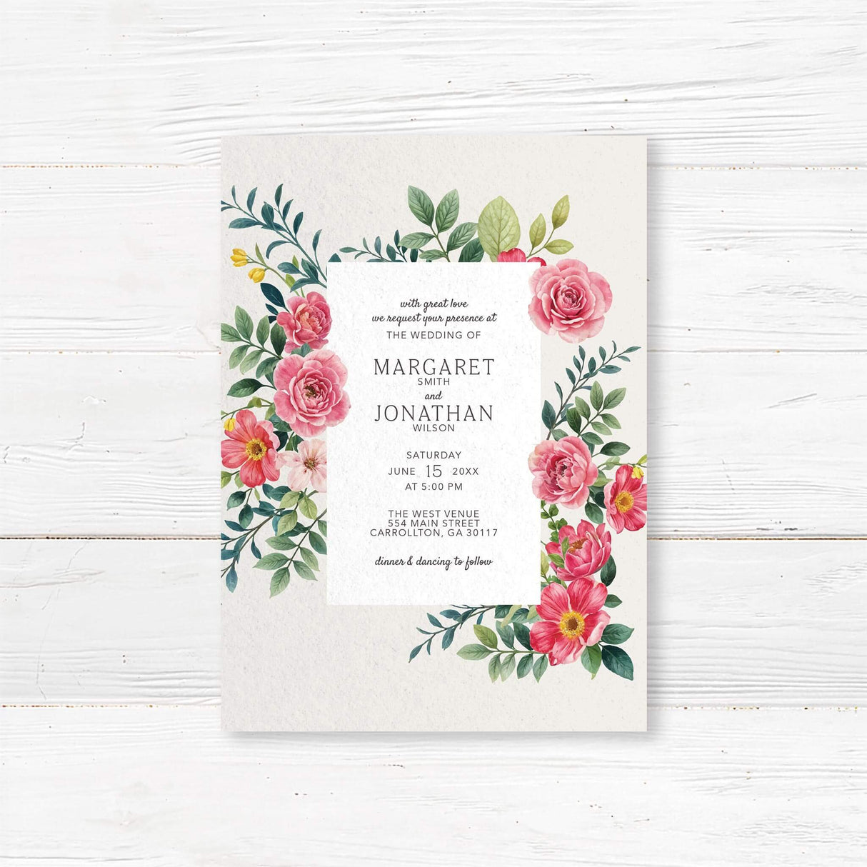 Elegant wedding invitation with a floral design featuring pink and red roses, green leaves, and delicate typography. The text is framed within a white rectangle, providing event details in a classic serif font. A romantic and timeless design perfect for wedding celebrations.