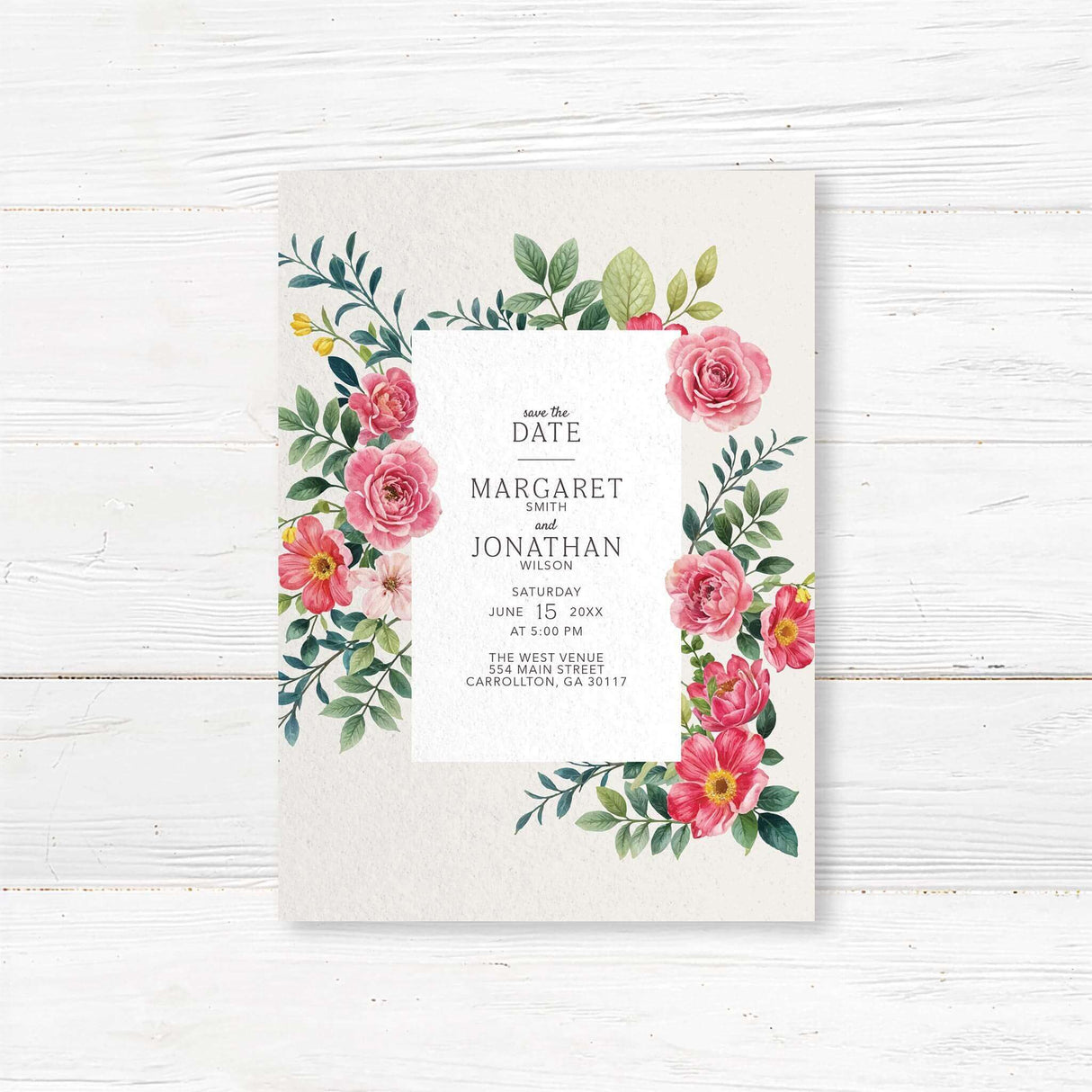 Elegant save the date with a floral design featuring pink and red roses, green leaves, and delicate typography. The text is framed within a white rectangle, providing event details in a classic serif font. A romantic and timeless design perfect for wedding celebrations.