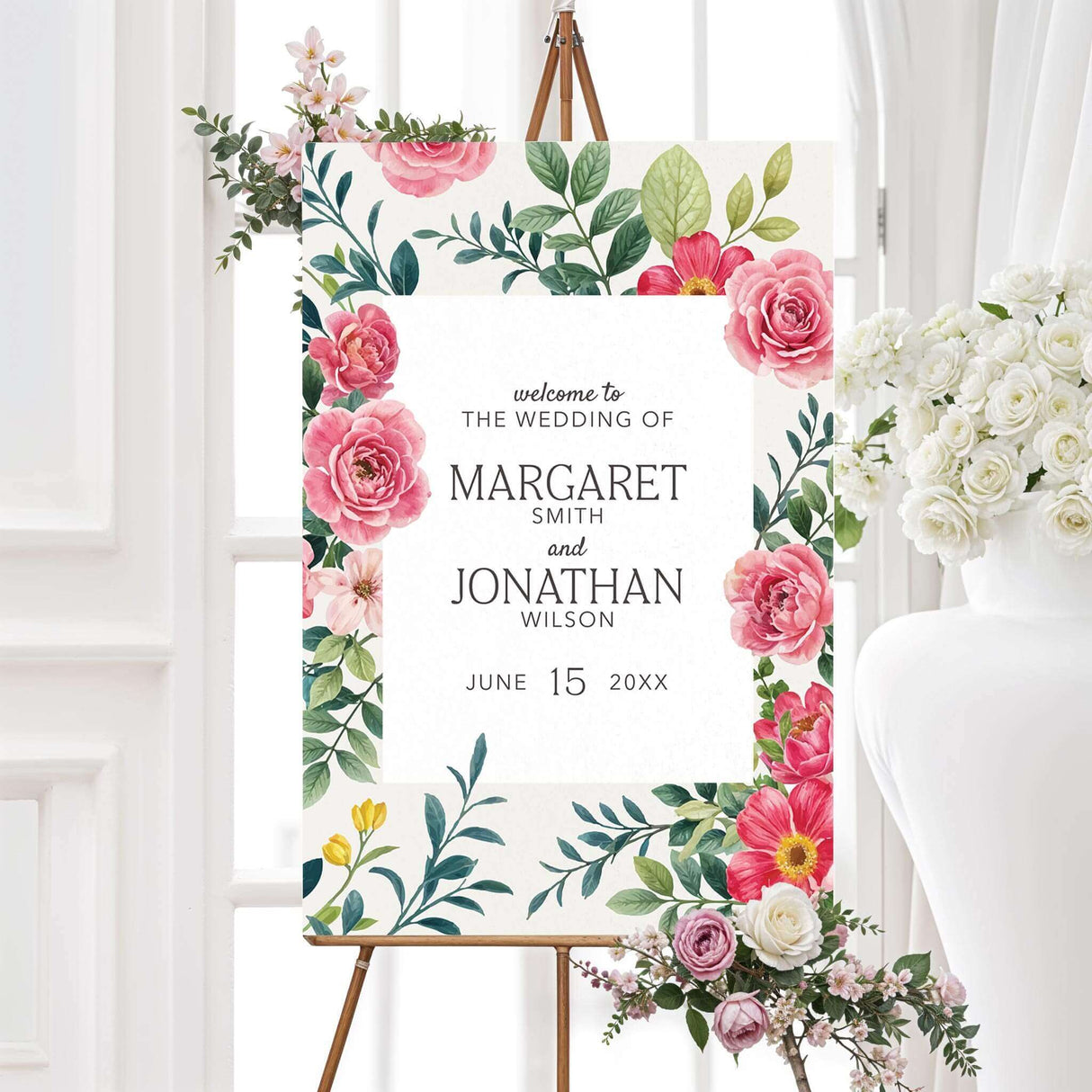 Elegant sign with a floral design featuring pink and red roses, green leaves, and delicate typography. The text is framed within a white rectangle, with a classic serif font. A romantic and timeless design perfect for any event.
