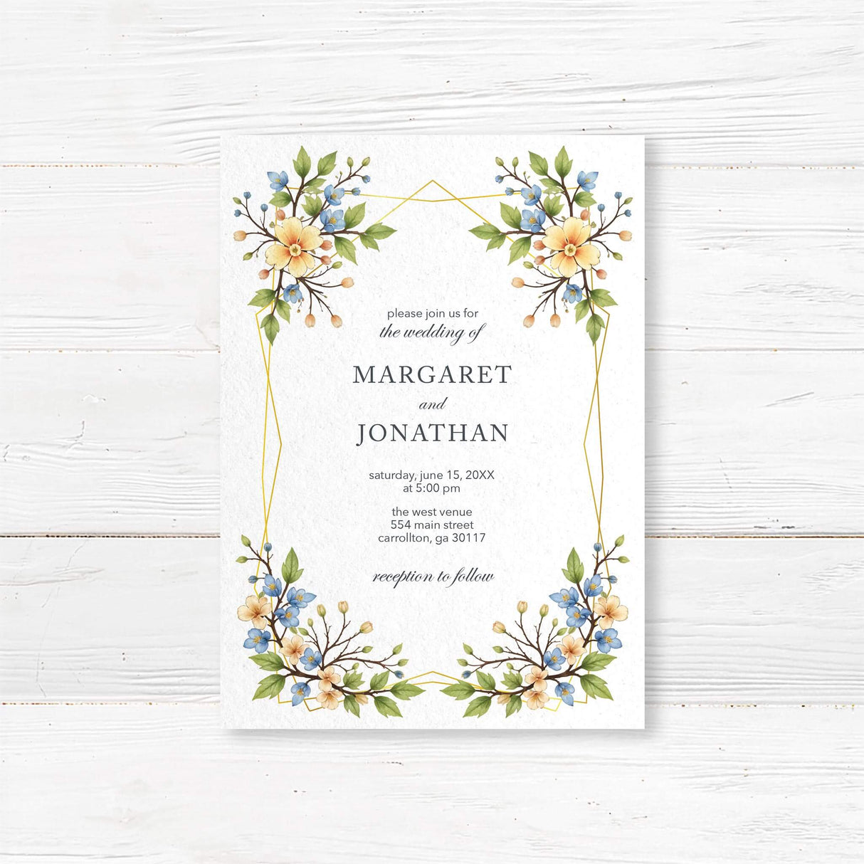 Elegant wedding invitation featuring a delicate watercolor floral border with yellow and blue flowers intertwined with greenery and a modern gold geometric frame. A timeless and sophisticated design perfect for garden, rustic, and classic weddings.