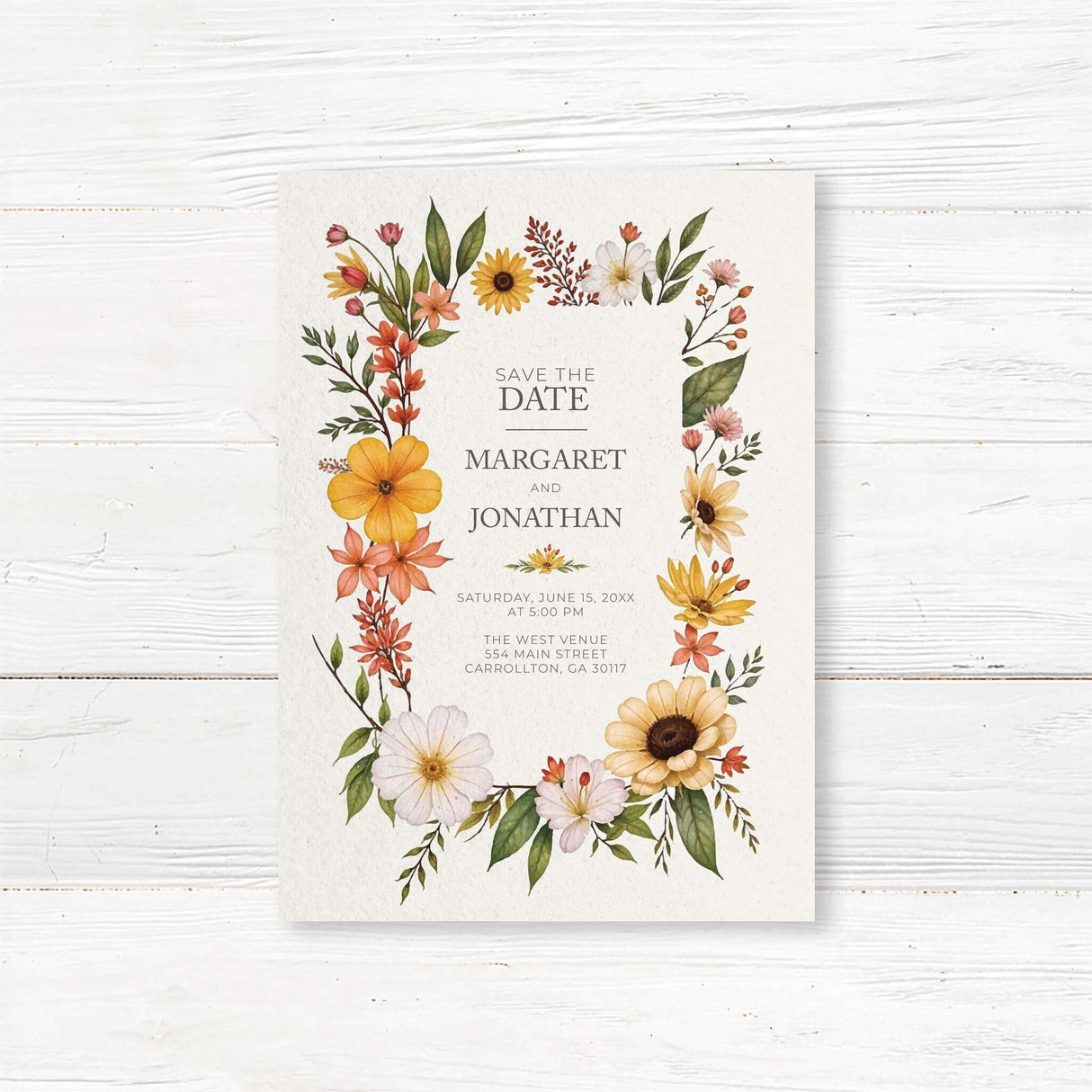Elegant save the date with a watercolor-style floral border featuring sunflowers, daisies, and wildflowers in warm shades of yellow, orange, and white. The design has a soft, natural aesthetic with delicate typography centered within the floral frame, creating a romantic and timeless look.