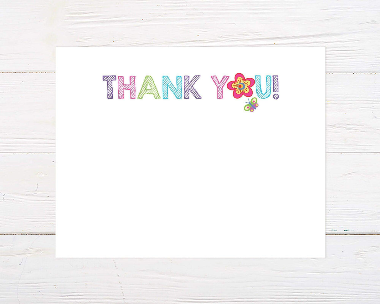 Colorful “Thank You” text is written in a playful, hand-drawn style with a flower replacing the “O” and a butterfly nearby. The background is plain, leaving room for a cheerful and bright message.