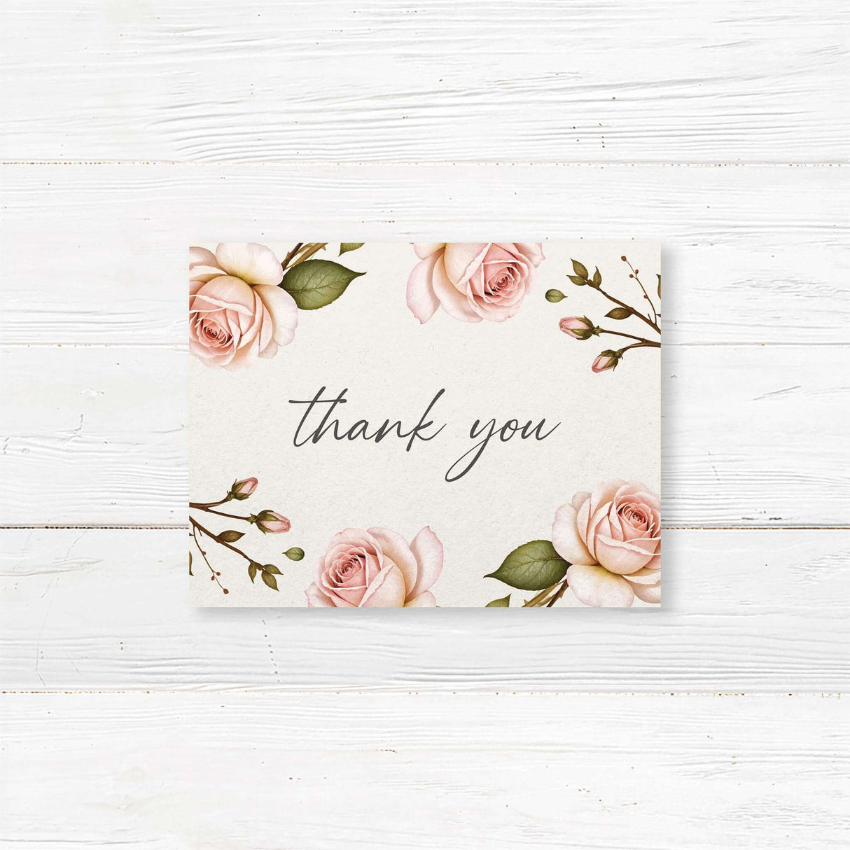 Charming thank you card with a delicate watercolor blush pink rose design, perfect for expressing gratitude with elegance and warmth. A timeless keepsake for wedding guests and loved ones.