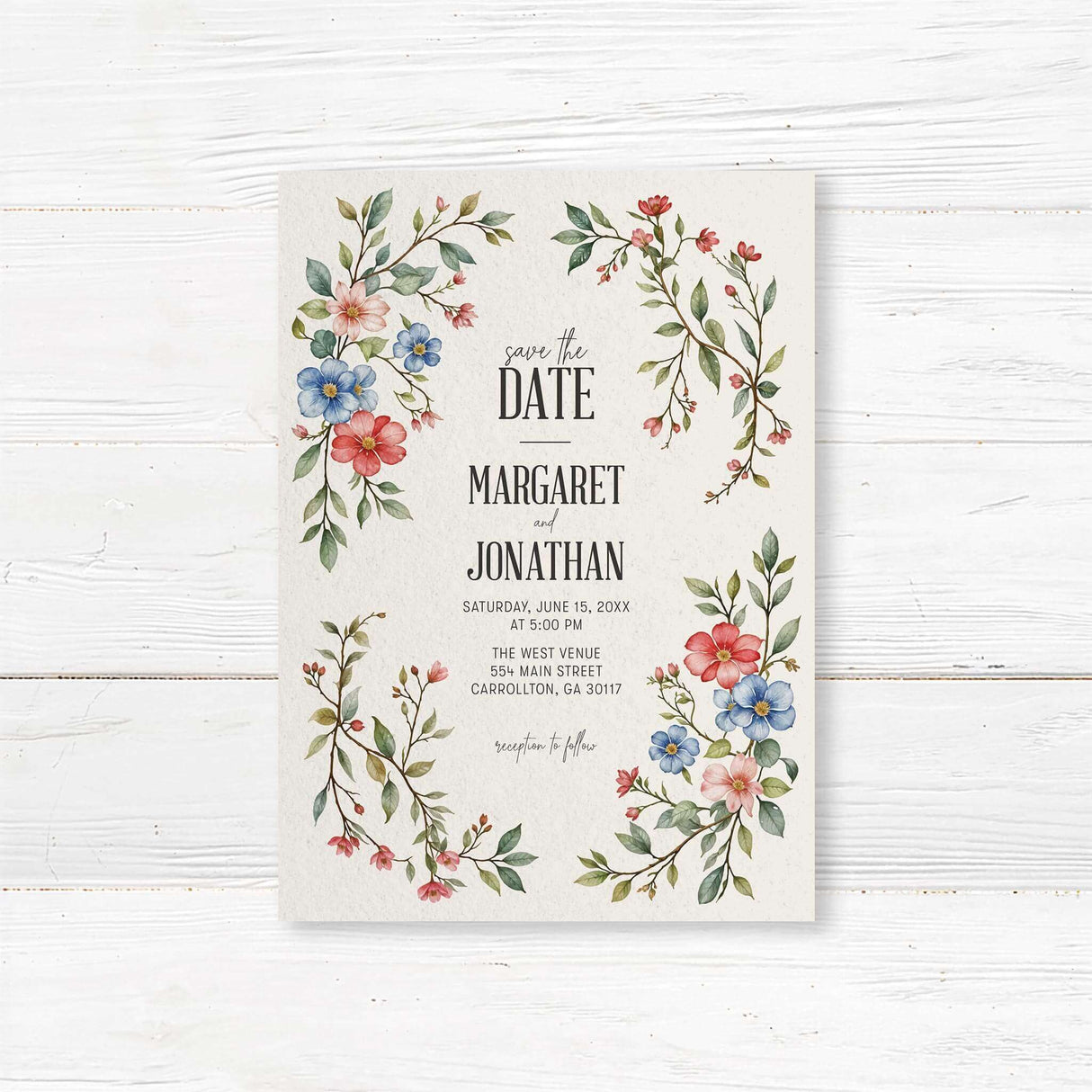 Elegant wedding save the date featuring a delicate watercolor floral design with red, blue, and pink flowers intertwined with green leaves. The layout is balanced with soft botanical elements framing the text, creating a romantic and timeless aesthetic