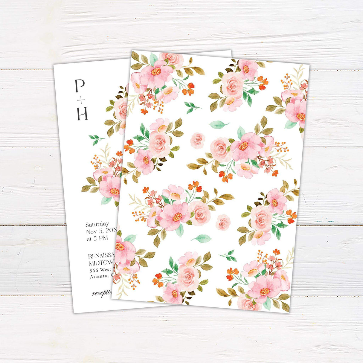 Wedding invitation with sweeping watercolor floral vine in pink, coral, and green tones on a white background with serif and script typography. -back side