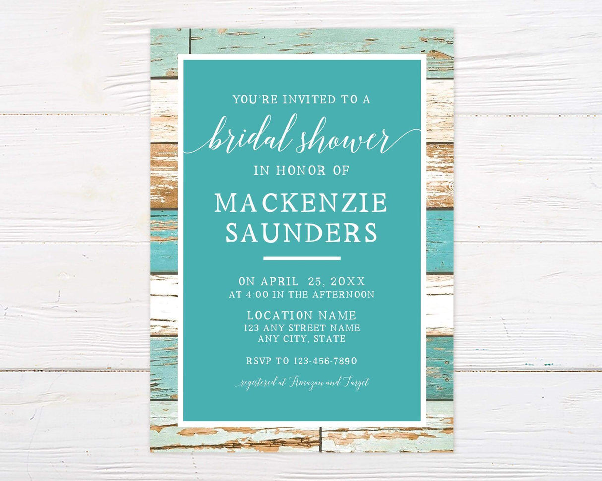 A teal wood bridal shower invitation with white text and a rustic wood background. The design features a clean layout with a modern script font.