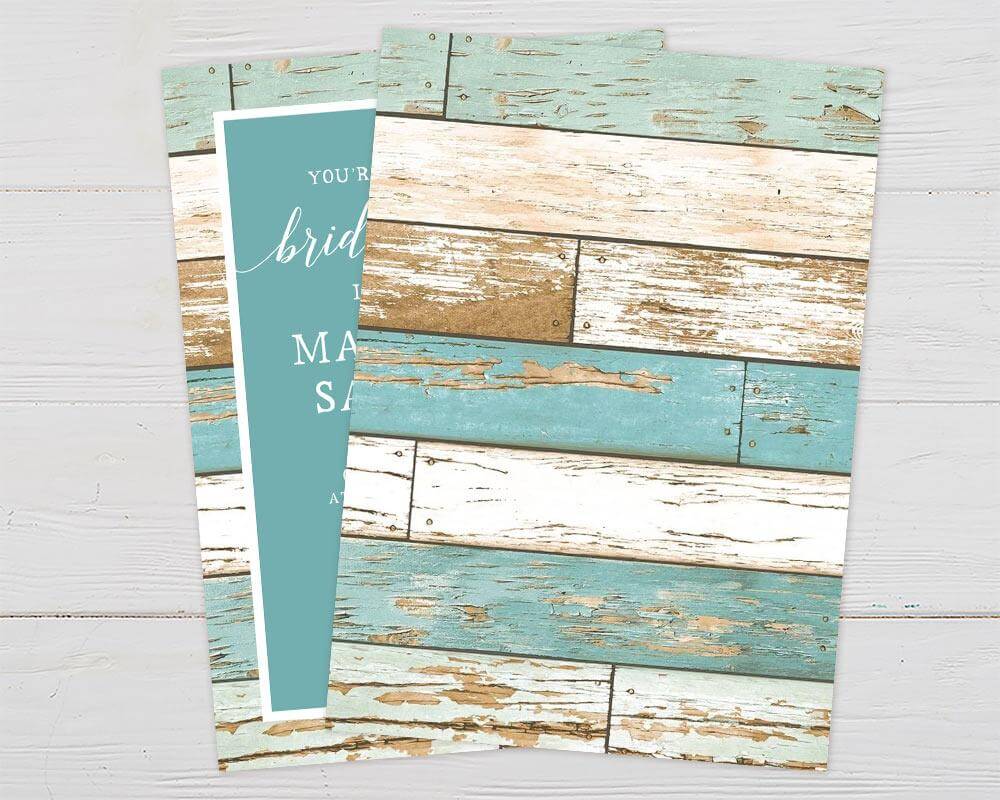 A teal wood bridal shower invitation with white text and a rustic wood background. The design features a clean layout with a modern script font. - back.