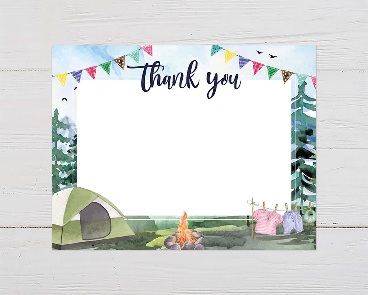 Rustic baby shower thank you card featuring a watercolor camping scene with mountains, trees, and a cozy campfire. A perfect way to show gratitude after an adventure-themed baby shower.