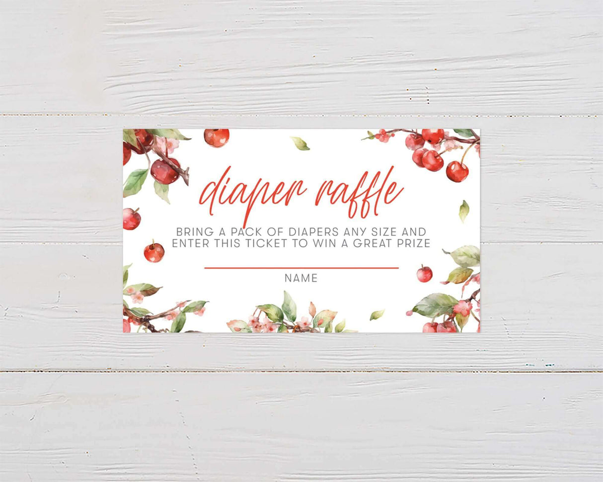 Apple-themed diaper raffle ticket for baby shower with watercolor cherries and floral design.