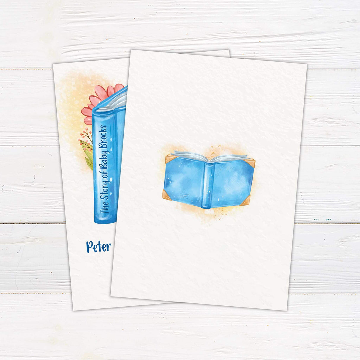 The Story Of Baby Shower Invitation with blue book design on a white wood background, perfect for celebrating new beginnings.