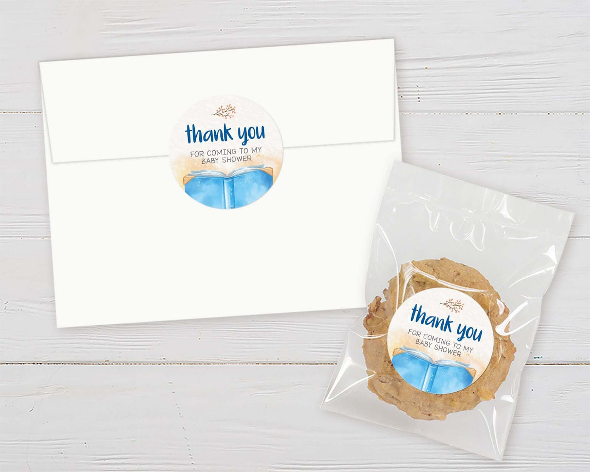 Thank you baby shower gift set with envelope and cookie on white background.