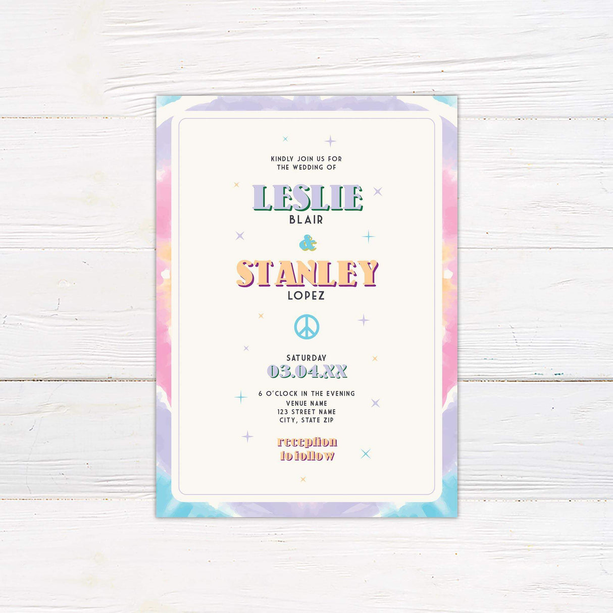 Colorful tie dye wedding invitation with pastel rainbow watercolor border, retro fonts, peace signs, and starburst accents for a playful boho vibe.