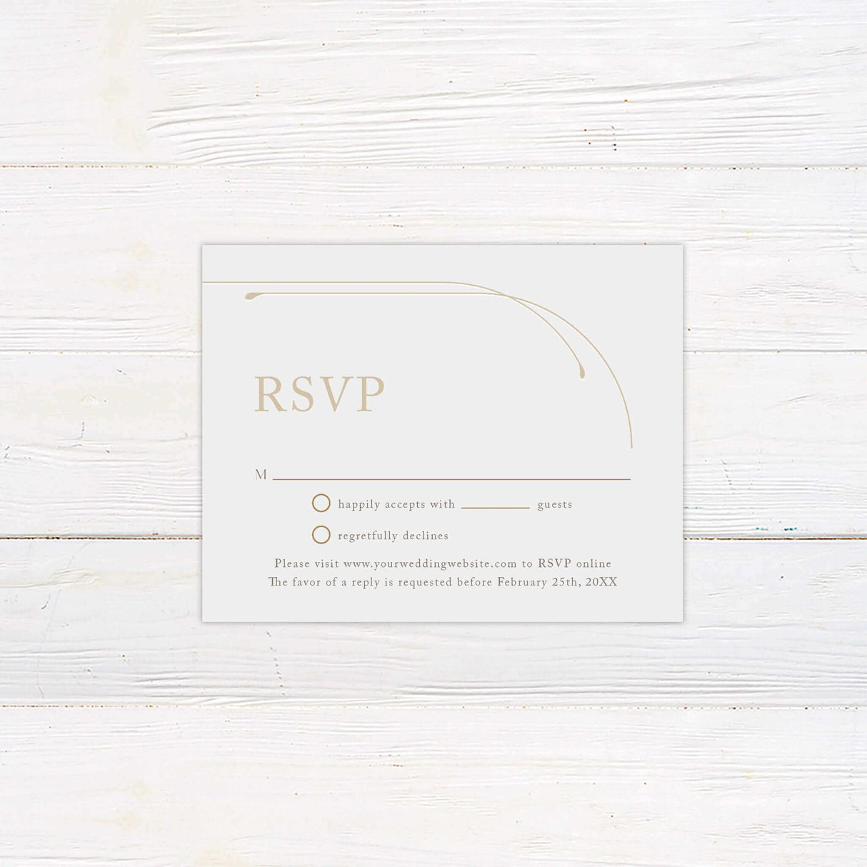 Elegant RSVP card designed with minimalist serif fonts and curved gold line art on smooth white cardstock. Includes traditional response options like “happily accepts” and “regretfully declines,” with space for guests to indicate party size. A stylish addition to modern wedding suites, this printed response card reflects a clean, contemporary style while aligning seamlessly with the gold-accented Timeless Curve invitation collection.