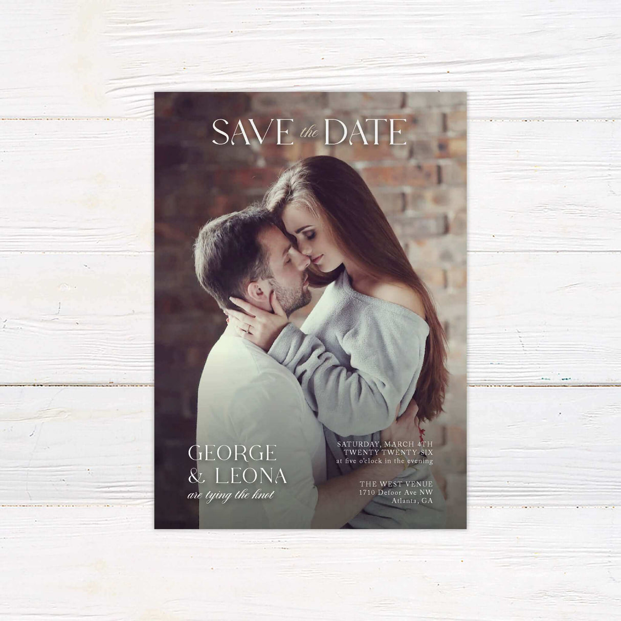 Photo Save the Date card featuring a full-size engagement photo background with classic serif typography overlaid in white, creating a soft, romantic, and editorial-style announcement. Perfect for modern weddings, this card combines minimalist design and personal imagery to beautifully showcase your wedding date. Printed on premium cardstock and part of a coordinated suite, it's ideal for couples seeking a photo-focused, elegant Save the Date with a clean, timeless feel.
