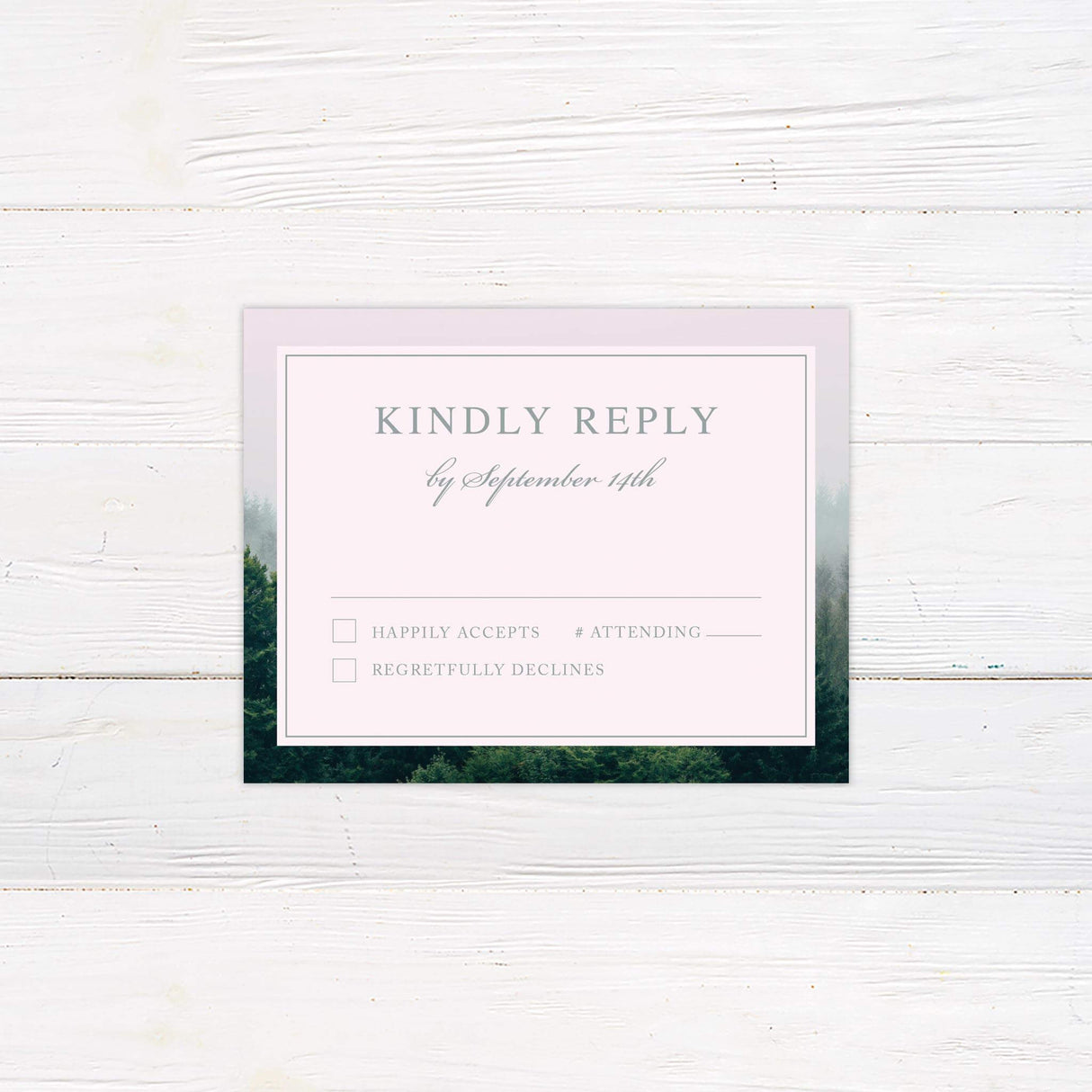 Coordinating RSVP card with misty forest background and elegant serif text layout.