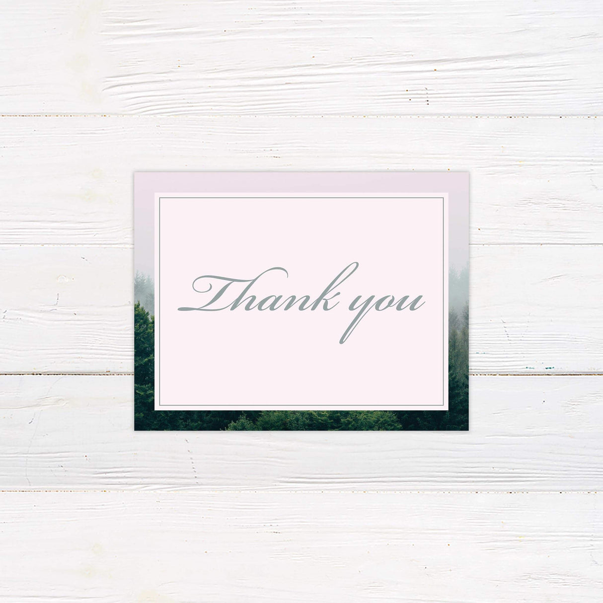 Thank you card featuring treeline elements and minimal elegant script.