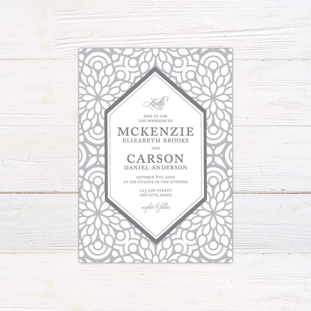 Taupe trellis patterned wedding invitation with white center panel, elegant serif fonts, and printed on premium cardstock.