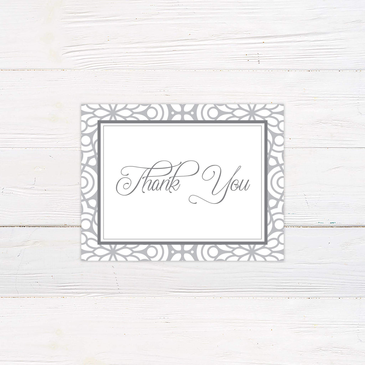Elegant thank you card with taupe pattern and classic script text.