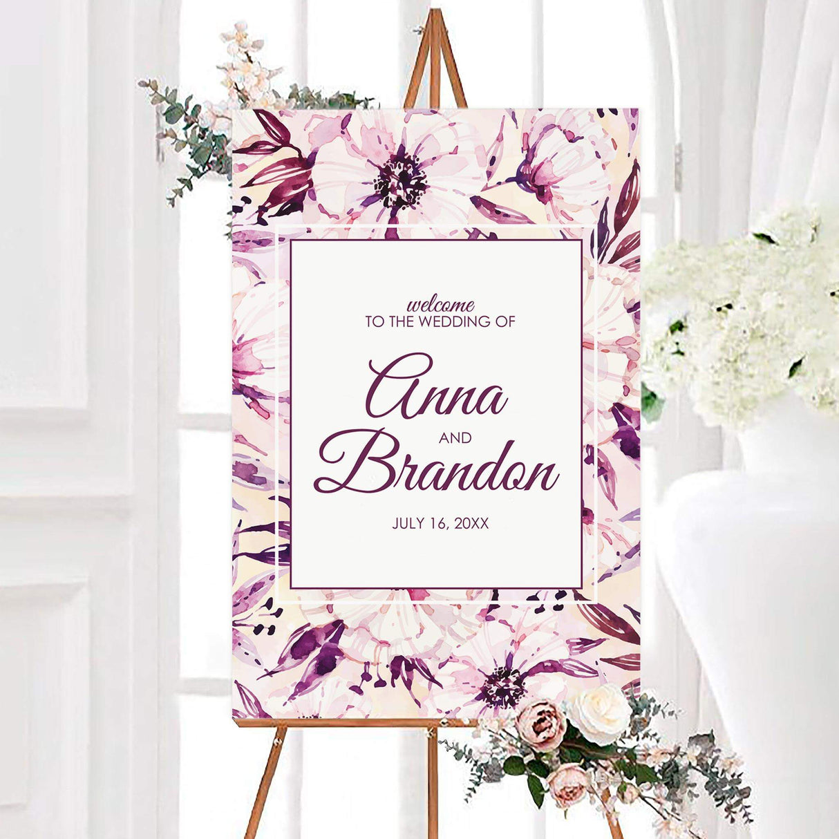Wedding welcome sign with bold purple floral border and stylish serif fonts.