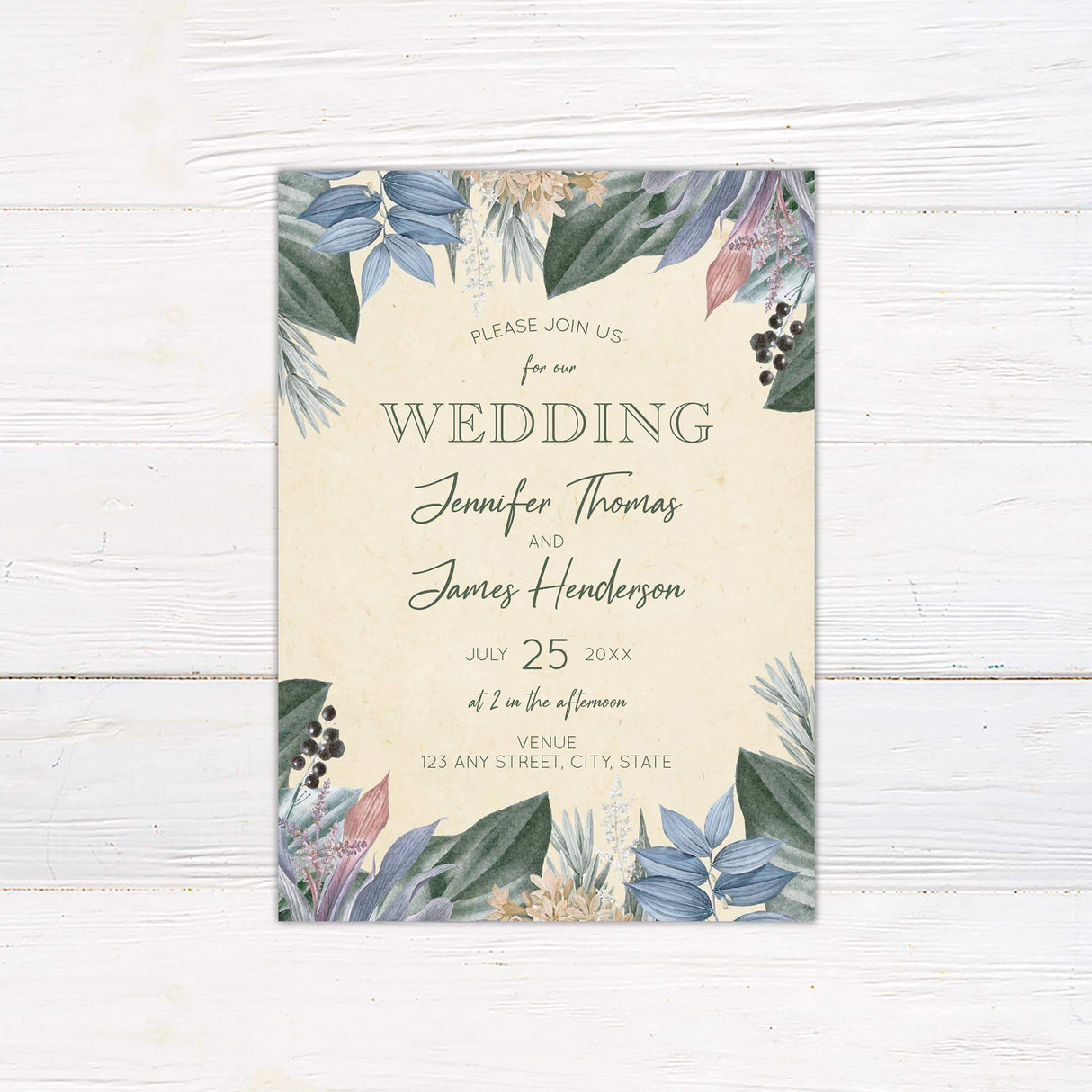 Watercolor tropical floral wedding invitation with pastel leaves, romantic script and serif fonts on a creamy textured background.