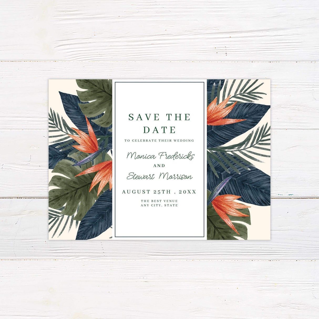 Save the Date card with tropical floral frame and bold serif headline.